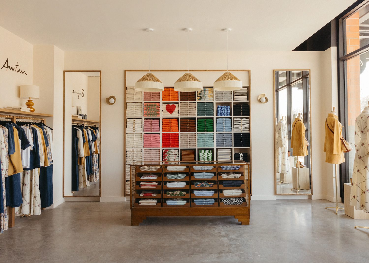 Store image of colorful wall of sweaters